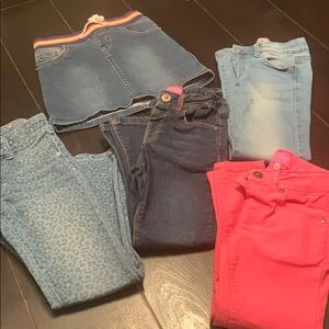 Girls skirt and 4 pair of jeans